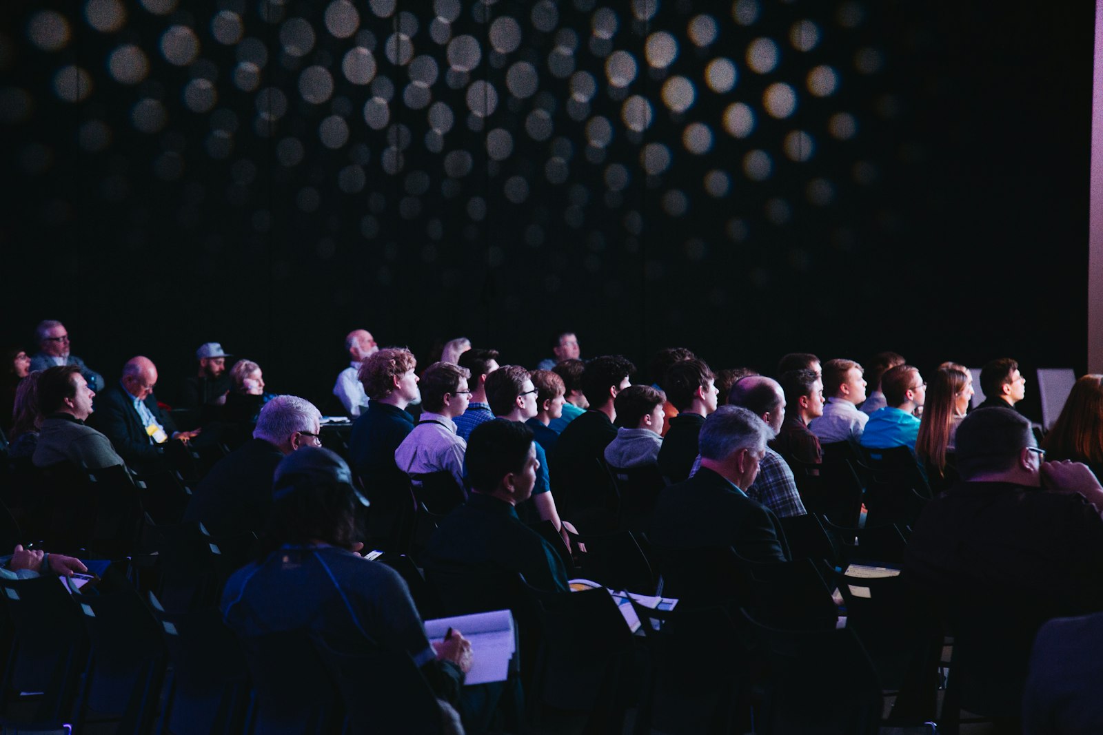 Large conference audience during a keynote
